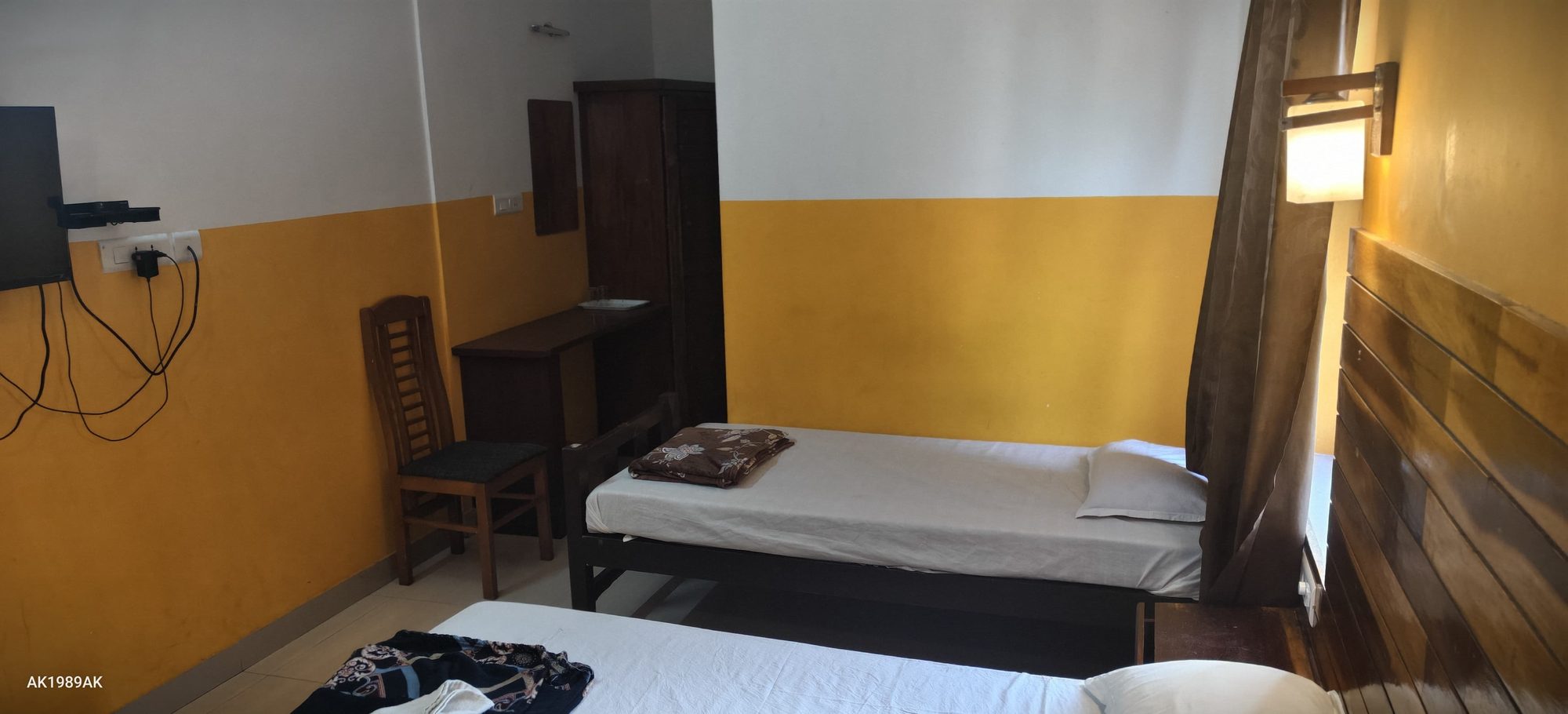 Room with TV setup at Jumayira International